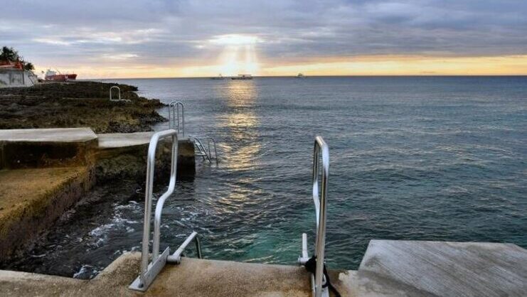 picture of ladder going into the sea