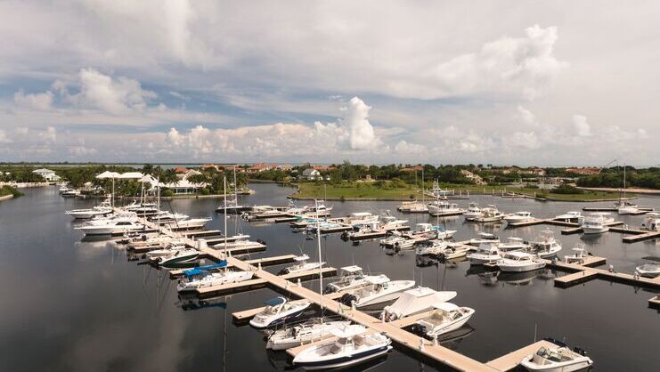 picture of dozens of boats at the cayman islands yacht club