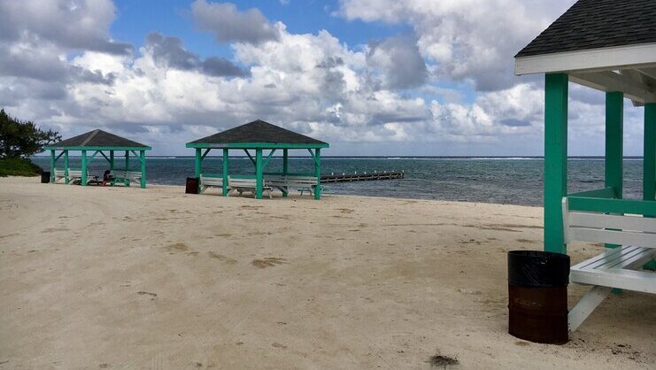 picture of beach with cabanas